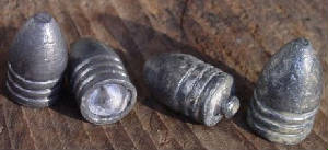 Civil War weapons and lethal Minié Bullets.jpg