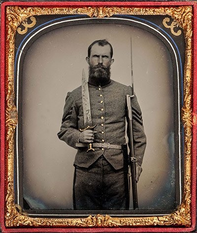 Confederate cavalry soldier with weapons.jpg