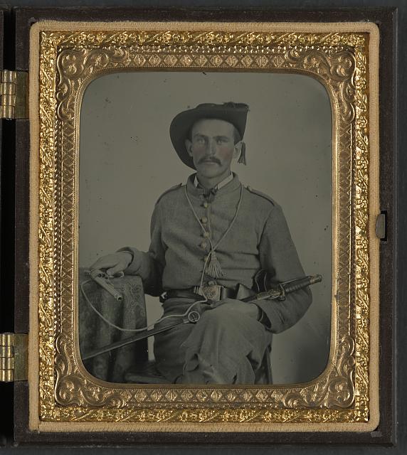 Confederate sword and pistol.jpg