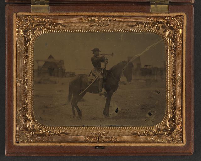 Union Cavalryman mounted and blowing bugle.jpg