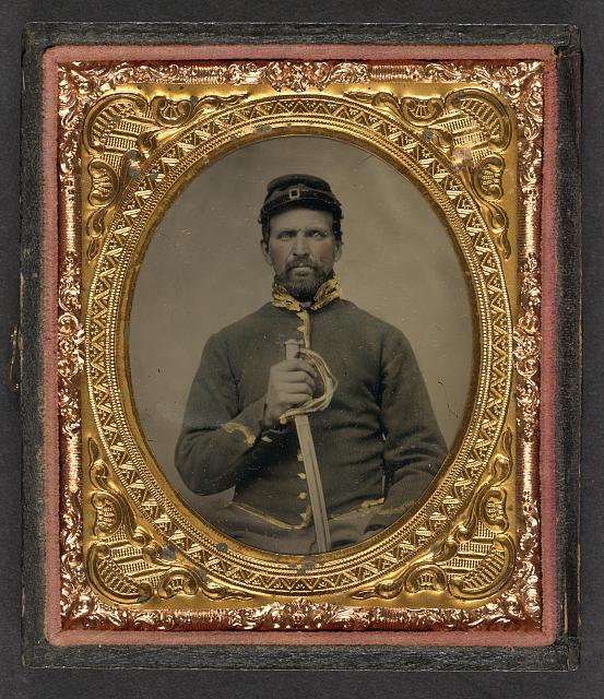 Union Cavalryman holding cavalry saber.jpg